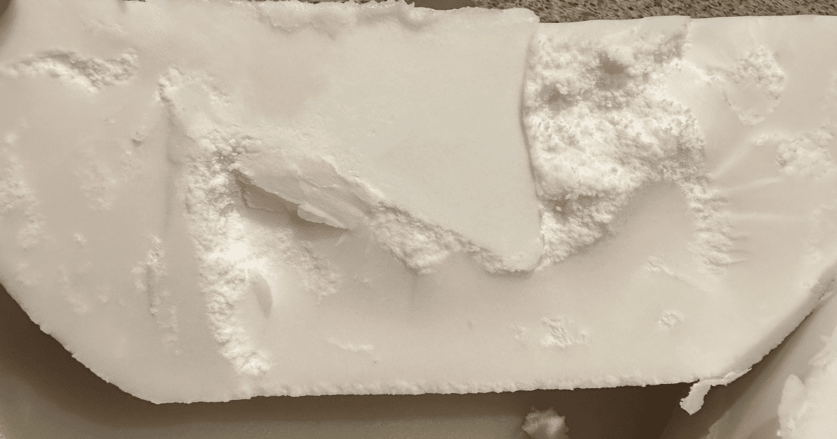 A large white chunk of triple rendered, clean, white, grass fed and finished beef tallow ready to be handcrafted into Whip Tallow Balm.