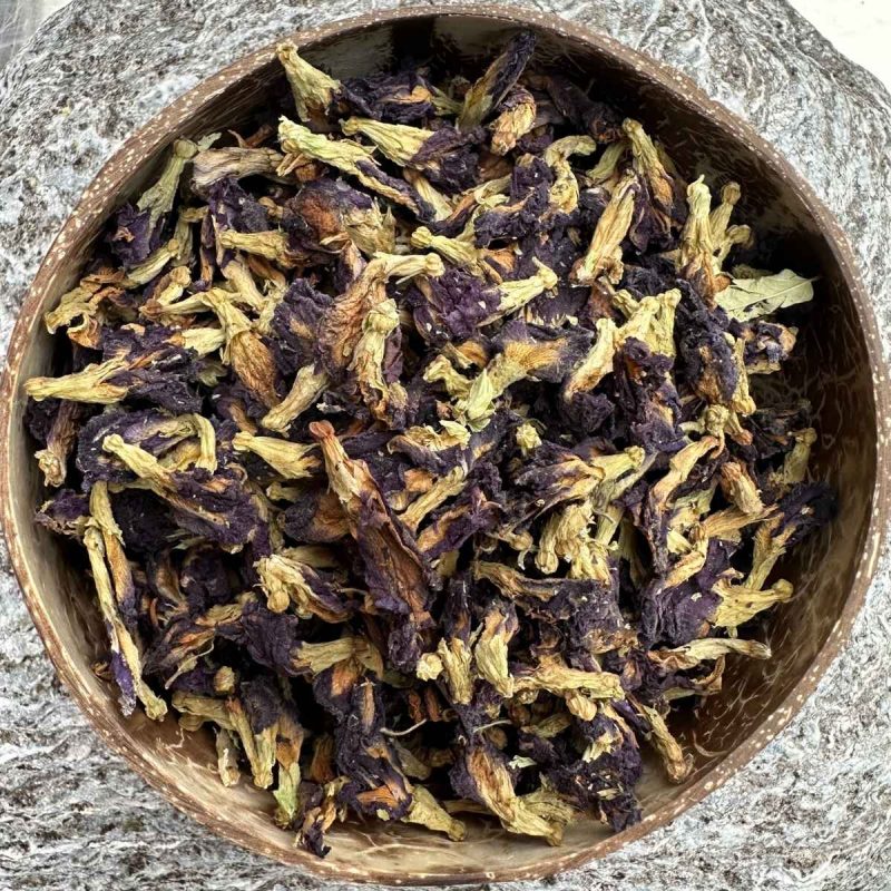 Organic Blue Butterfly Pea Flowers dried whole in a coconut bowl