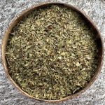 Organic Lemon Balm dried leaf in a coconut bowl